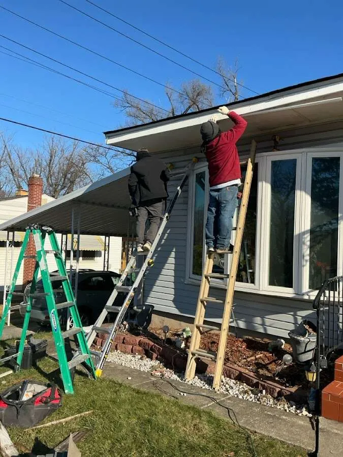Restoration crew performing exterior repair in Greenfield